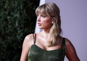 (FILE) Taylor Swift brings a billion dollars of publicity to NFL, according to marketing firm