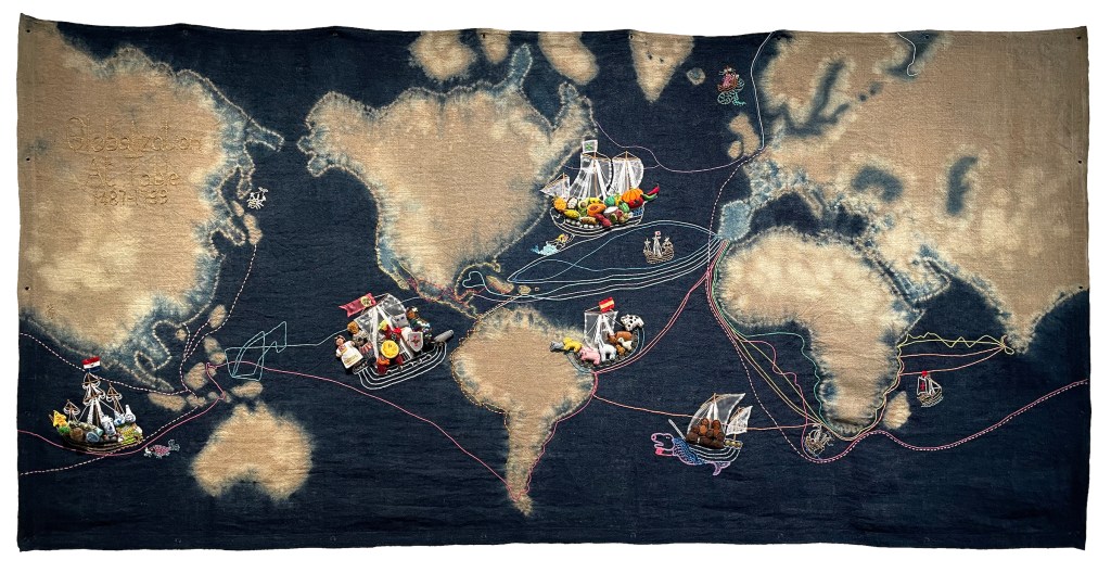 Wen-Jen-Deng_Globalization-at-table-embroidery-indigo-dyeing-burlap-fabric-Mixed-media-2023-59x118-in.-E9A490E6A18CE4B88AE79A84E585A8E79083E58C96
