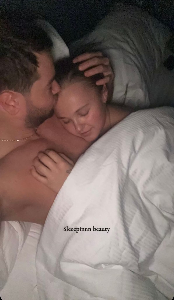 Chris-Hughes-and-JoJo-Siwa-Cozy-Up-Together-in-Bed
