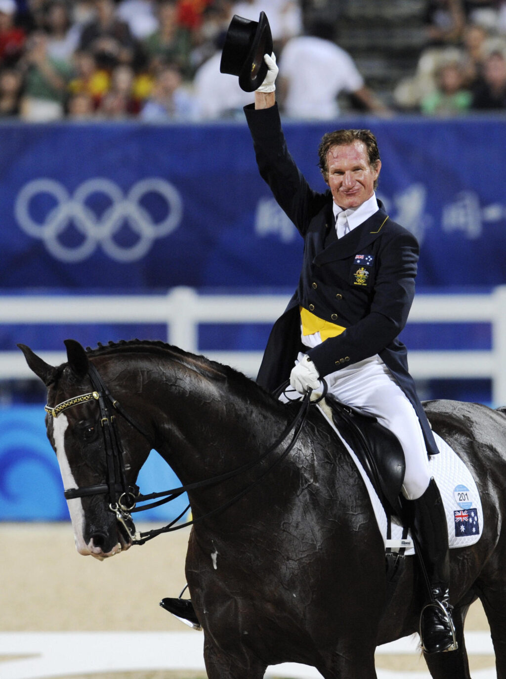 Australias Heath Ryan waves after riding