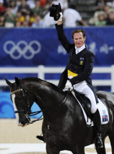 Australias Heath Ryan waves after riding