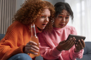 medium-shot-women-watching-sports-1024x683-1