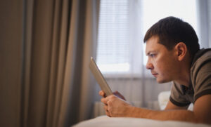 side-view-adult-male-working-from-home-1024x618-1