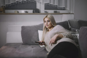 woman-watching-tv-sofa-1024x683-1