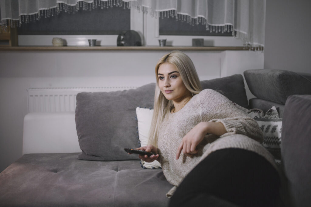 woman-watching-tv-sofa-1024x683-1